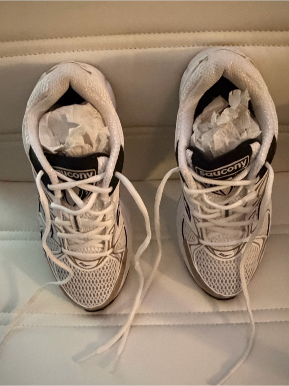Saucony Unisex in white. I bought as Women’s Size 7M. Snug fit. I needed a 7.5M